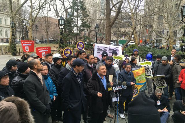 Dr. Dr. Do Lee, a member of the #DeliverJusticeCoalition who wrote his PhD thesis in environmental psychology on delivery cyclists at the CUNY Graduate Center, speaks at a rally outside City Hall in support of legislation that would legalize e-bikes and e-scooters.
